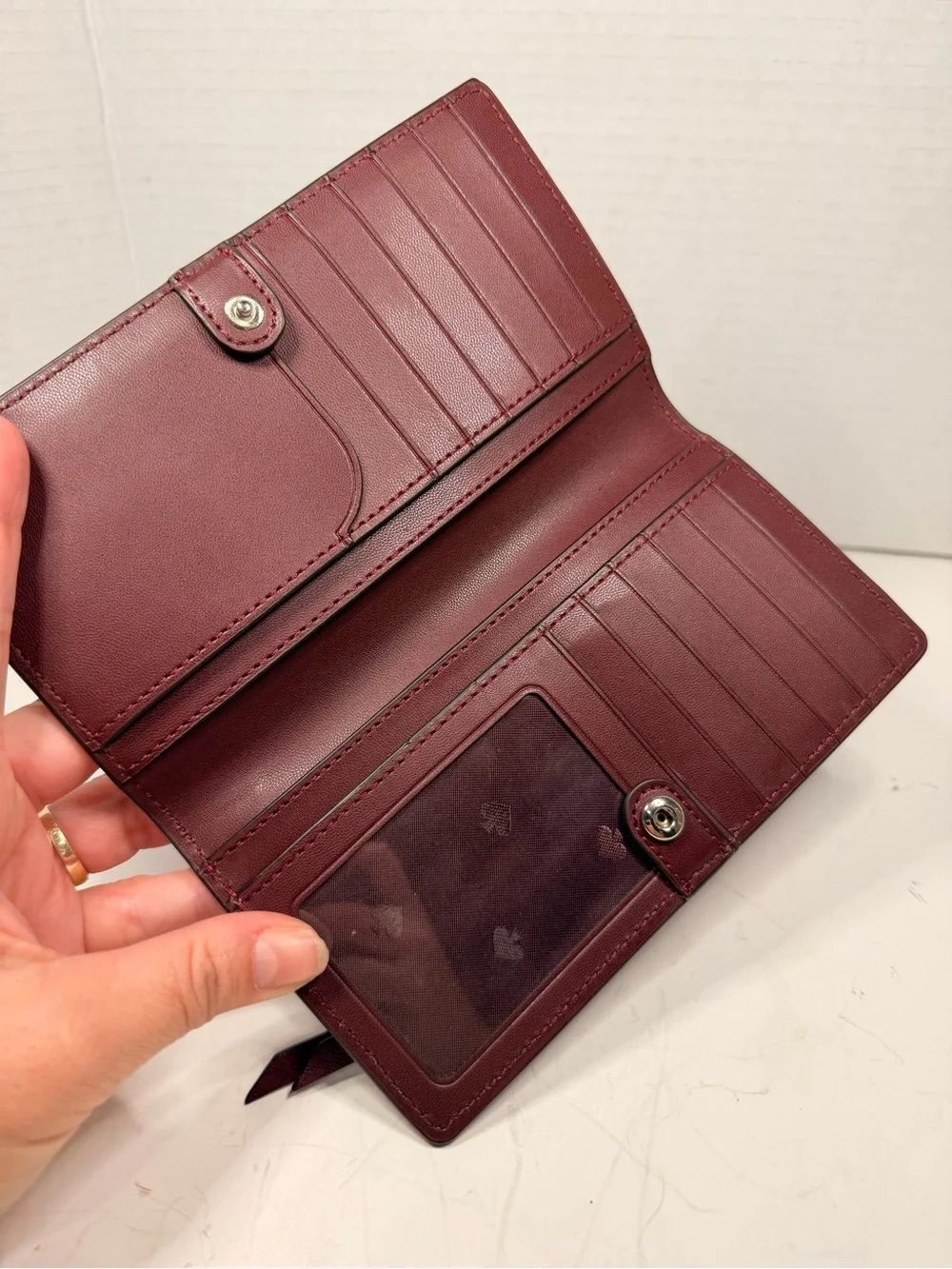Kate Spade Cameron Large Slim Bifold Wallet in Burgundy Saffiano Leather